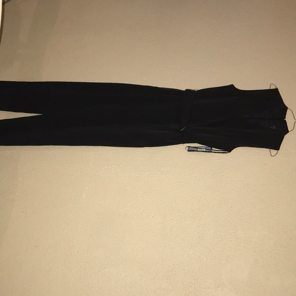 Black/white jumpsuit usa size is 6